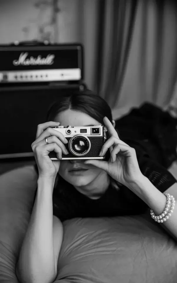Vintage mirror selfie with a Leica camera | moody film photography aesthetic