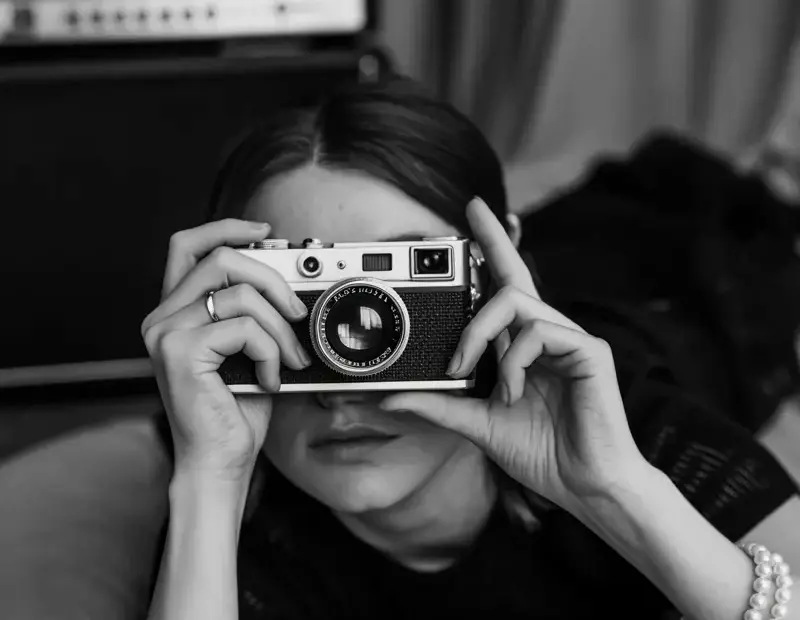Vintage mirror selfie with a Leica camera | moody film photography aesthetic